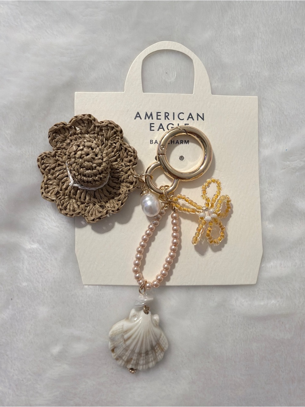 American Eagle Outfitters Brown Straw Flower & Gold Bead Shell Keychain